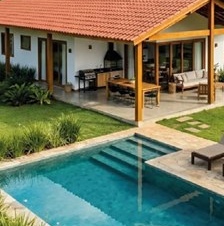 Casa contemporânea com piscina e área gourmet